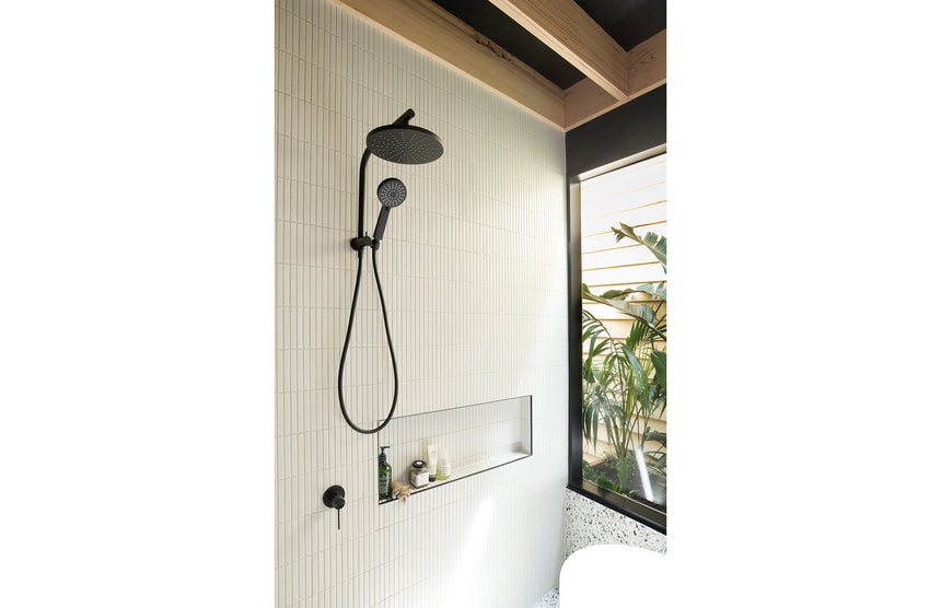 Phoenix Vivid Slimline Compact Twin Shower Matte Black, shown in a finished interior