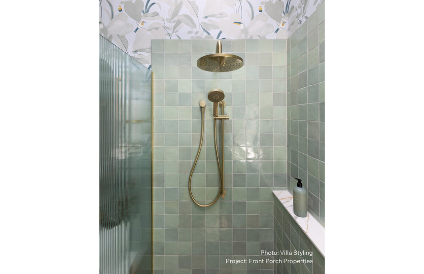 Phoenix Vivid Slimline Rail Shower Brushed Gold, shown in a finished interior