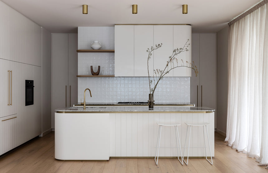 Phoenix Vivid Slimline Pull Out Sink Mixer 200mm Brushed Gold, shown in a finished interior