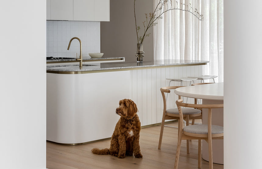 Phoenix Vivid Slimline Pull Out Sink Mixer 200mm Brushed Gold, shown in a finished interior