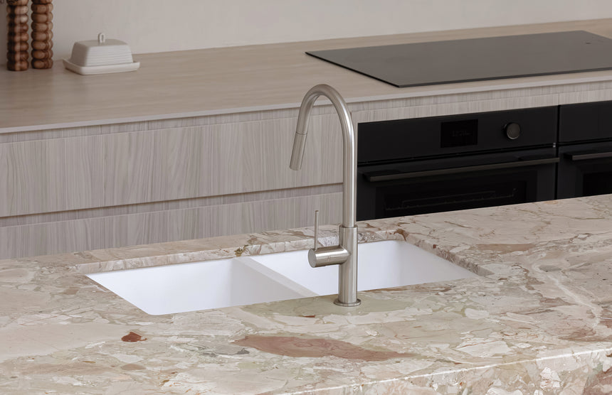 Phoenix 5000 Series Double Bowl Under / Over Sink Matte White, shown in a finished interior