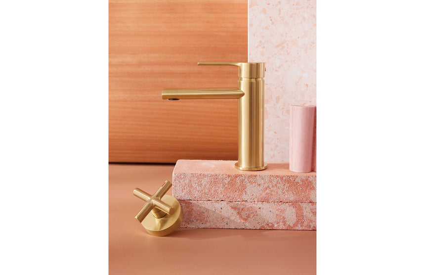 Phoenix Vivid Slimline Oval Basin Mixer Brushed Gold, shown in a finished interior