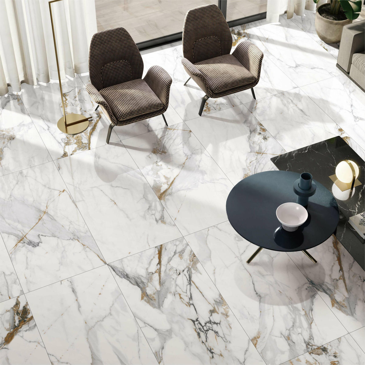 Calacutta Oro 1200x600mm polished white marble-look porcelain tiles installed as living area floor with grey and gold veining by Tilemall