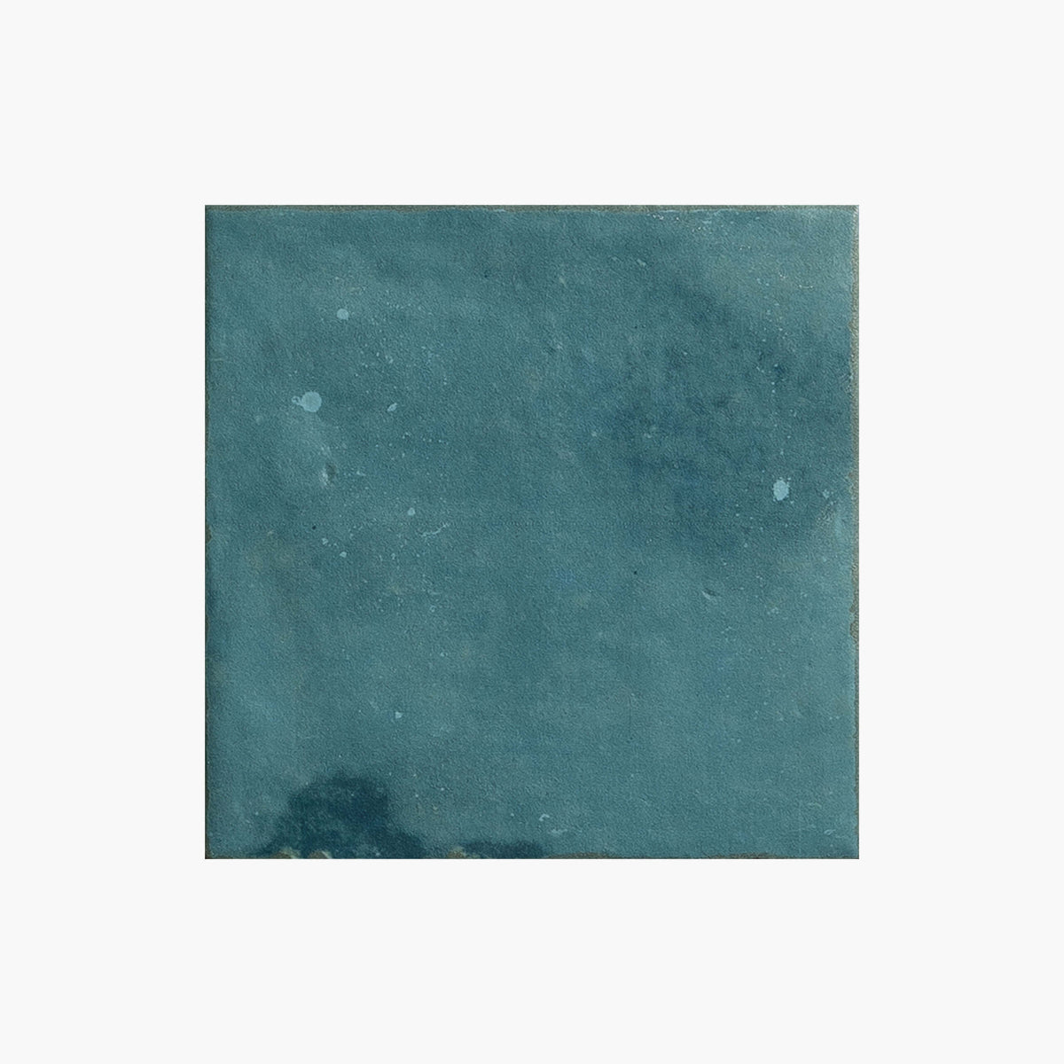 Marlow 115x115mm matt true turquoise encaustic-look ceramic tile by Tilemall with mottled surface texture